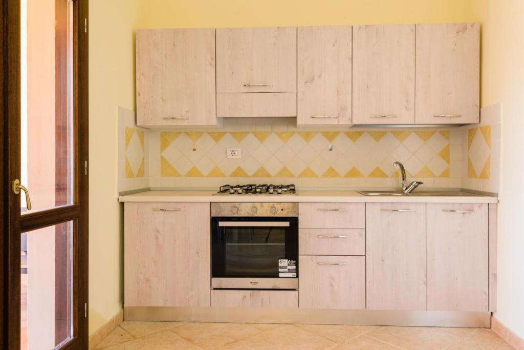 Le Perle Di Golfo Aranci Villa Bagian luar foto